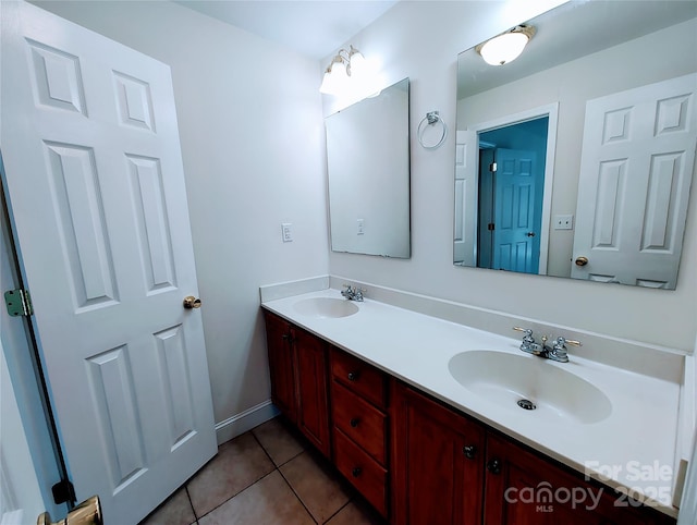1806 Bringle Ferry Rd, Salisbury, NC 28146 - bathroom featuring double vanity, tile patterned flooring, and a sink