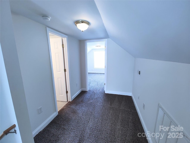 1806 Bringle Ferry Rd, Salisbury, NC 28146 - bonus room with dark colored carpet, vaulted ceiling, and baseboards