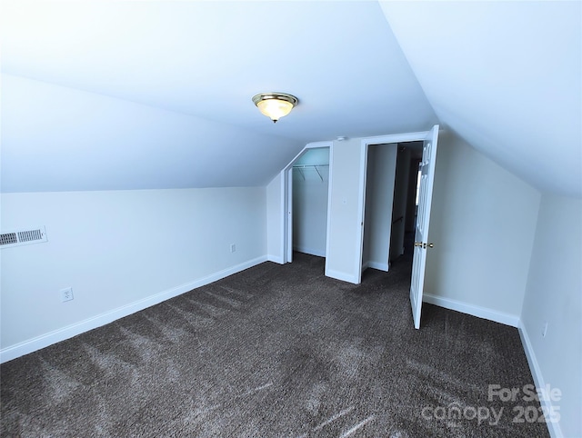 1806 Bringle Ferry Rd, Salisbury, NC 28146 - bonus room with vaulted ceiling, dark colored carpet, visible vents, and baseboards