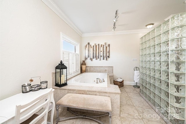 full bath featuring baseboards, track lighting, ornamental molding, and a bath