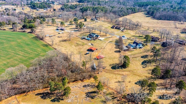 birds eye view of property featuring a rural view