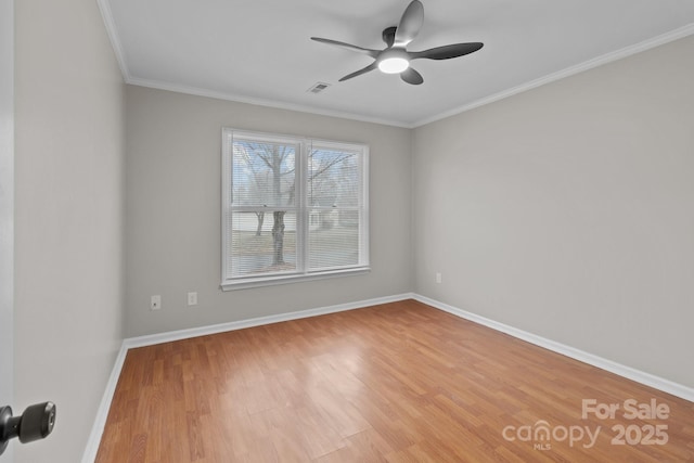 unfurnished room featuring baseboards, visible vents, ceiling fan, ornamental molding, and light wood-style floors