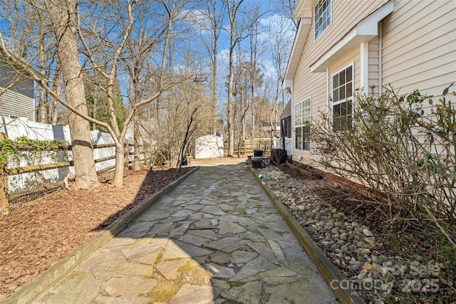 view of yard with a fenced backyard and a patio