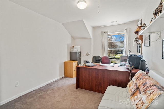 office featuring baseboards, visible vents, and light colored carpet