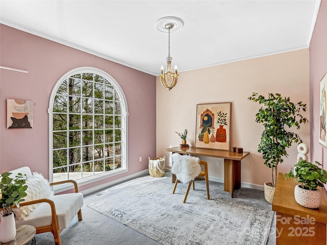 office with baseboards, carpet floors, ornamental molding, and an inviting chandelier