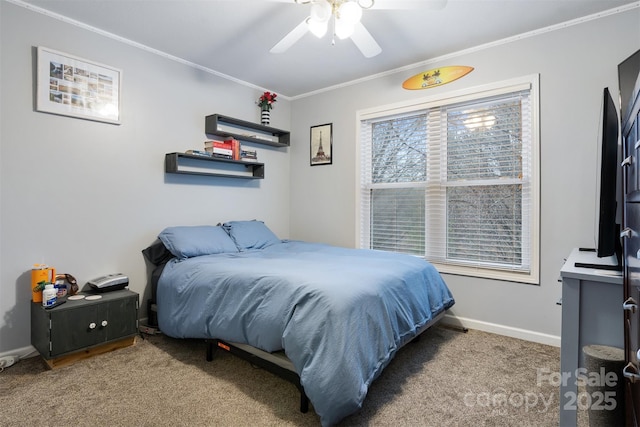 bedroom featuring crown molding, ceiling fan, baseboards, and light colored carpet