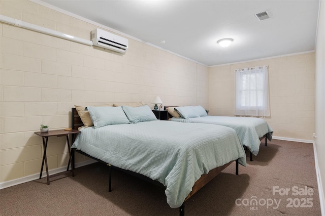 bedroom with baseboards, visible vents, ornamental molding, an AC wall unit, and carpet floors