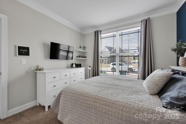 bedroom with baseboards, carpet floors, and crown molding