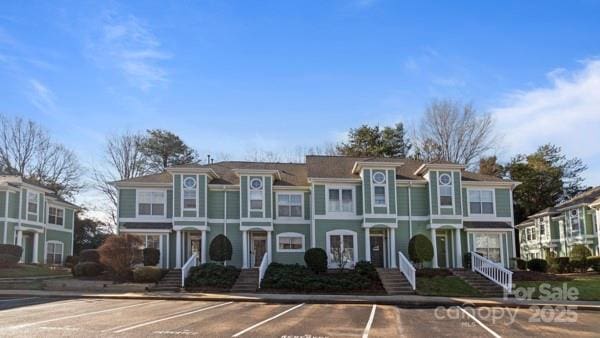 view of front of property with uncovered parking