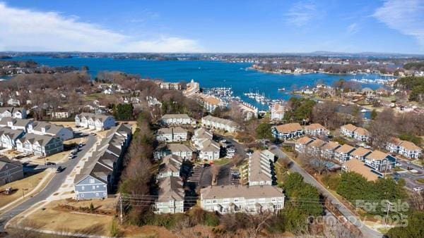 aerial view featuring a water view and a residential view