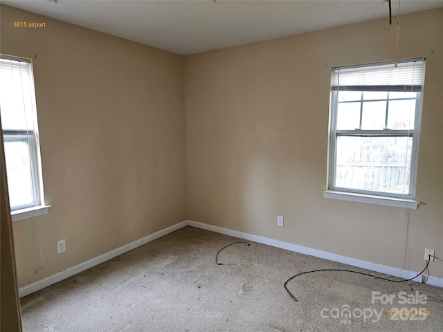 5315 Airport Dr, Charlotte, NC 28208 - carpeted spare room with baseboards and a healthy amount of sunlight