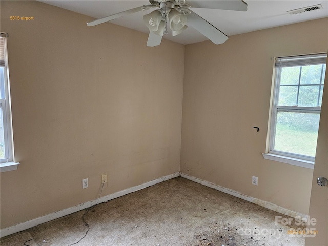 5315 Airport Dr, Charlotte, NC 28208 - empty room featuring baseboards, visible vents, and a ceiling fan