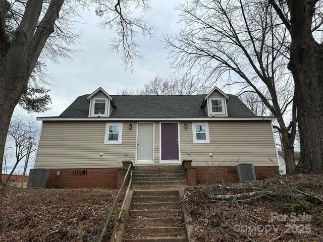 view of front facade featuring entry steps and crawl space