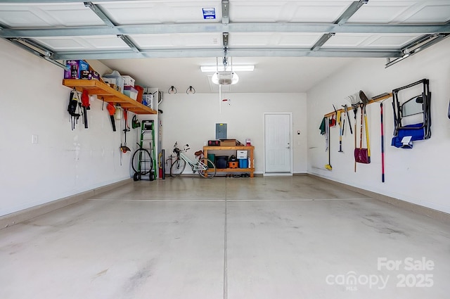 garage featuring baseboards and a garage door opener