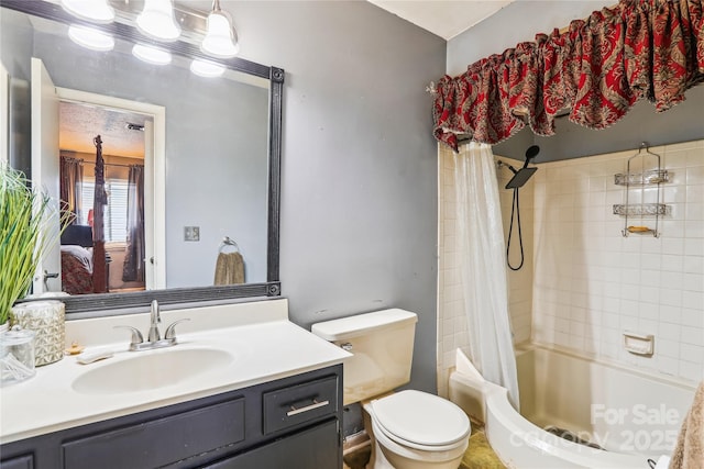 bathroom with shower / bath combination with curtain, vanity, and toilet