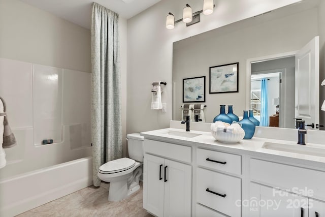 bathroom featuring double vanity, shower / bathtub combination with curtain, toilet, and a sink
