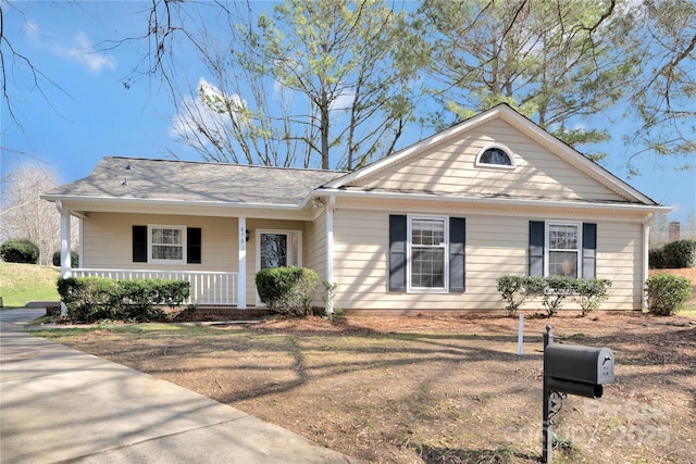 single story home with covered porch