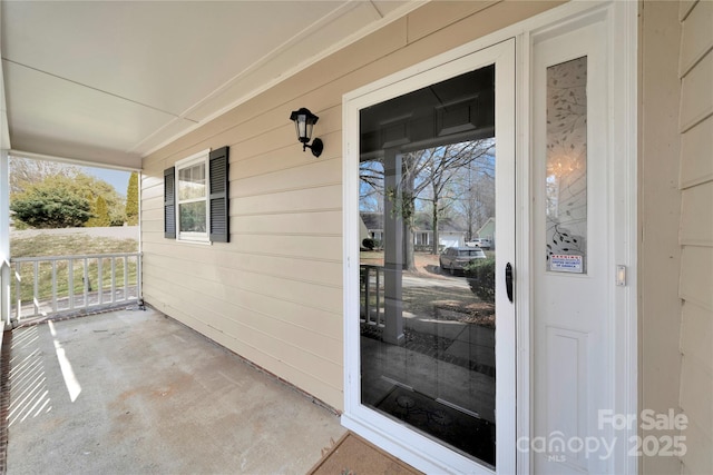 entrance to property with a porch