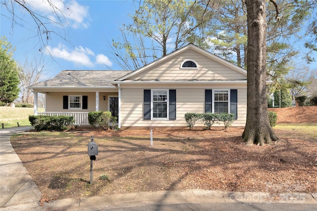 single story home featuring a porch