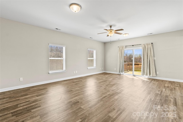2504 Hovis Rd, Lincolnton, NC 28092 - unfurnished room featuring ceiling fan, wood finished floors, and baseboards