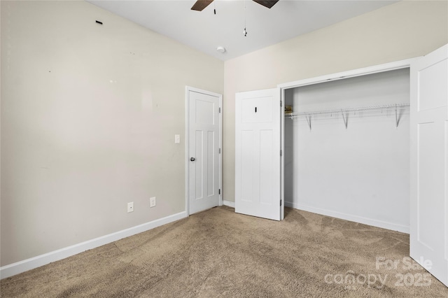 2504 Hovis Rd, Lincolnton, NC 28092 - unfurnished bedroom featuring carpet flooring, baseboards, a closet, and a ceiling fan