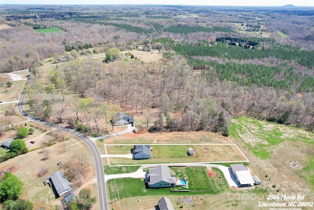 2504 Hovis Rd, Lincolnton, NC 28092 - aerial view of property and surrounding area with a heavily wooded area and property parcel outlined