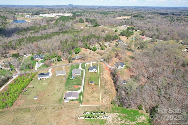 2504 Hovis Rd, Lincolnton, NC 28092 - aerial view of property and surrounding area featuring property boundaries highlighted, a forest, and a large body of water