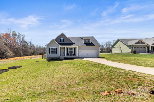 2504 Hovis Rd, Lincolnton, NC 28092 - view of front facade featuring driveway, covered porch, a front yard, and crawl space