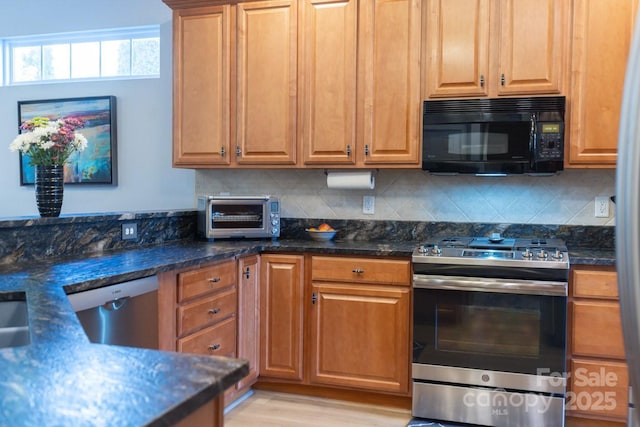 kitchen with appliances with stainless steel finishes, brown cabinetry, decorative backsplash, and a toaster