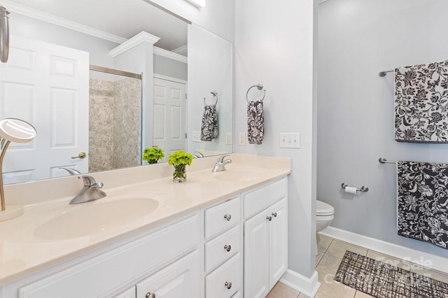 bathroom featuring crown molding, double vanity, a sink, and tile patterned floors