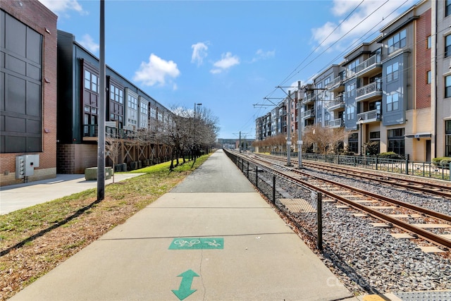 view of property's community with fence