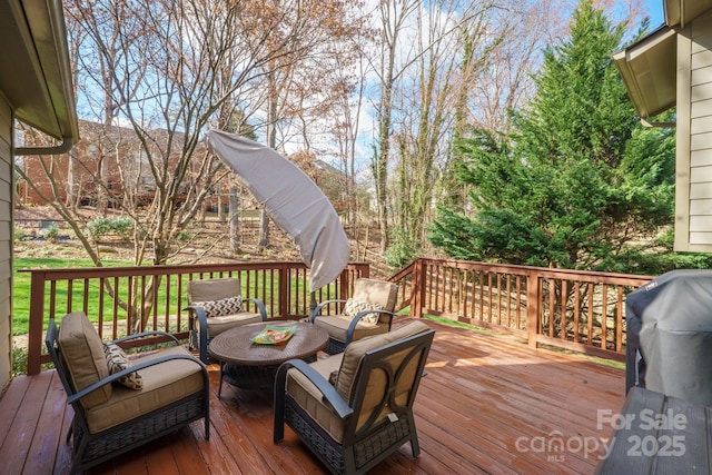 wooden terrace with area for grilling