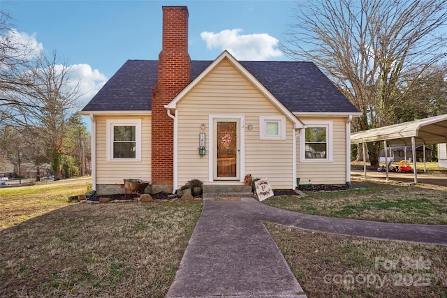 bungalow-style home featuring roof with shingles, a front lawn, a chimney, and a detached carport