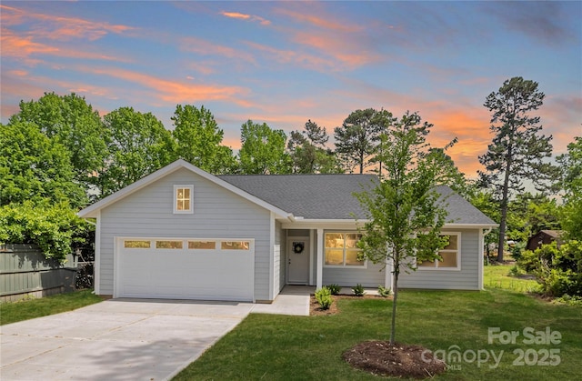 5404 Maplewood Ln, Charlotte, NC 28227 - view of front of property with driveway, a yard, an attached garage, and a shingled roof