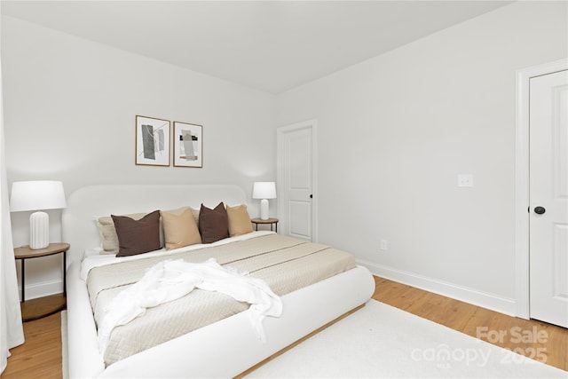 5404 Maplewood Ln, Charlotte, NC 28227 - bedroom featuring light wood-style flooring and baseboards