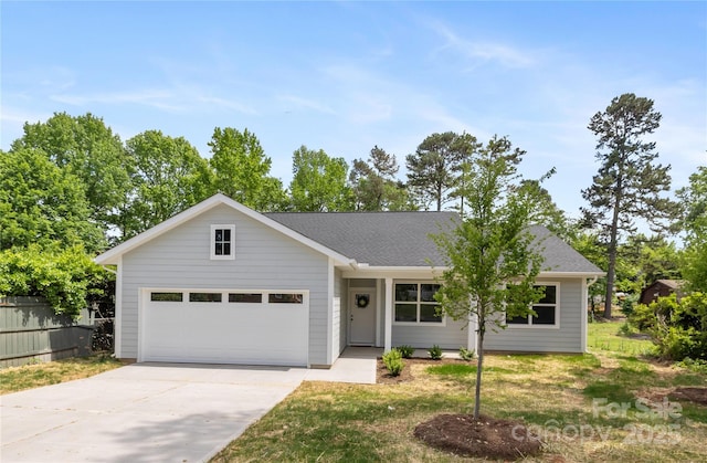 5404 Maplewood Ln, Charlotte, NC 28227 - single story home featuring driveway, a garage, roof with shingles, and fence