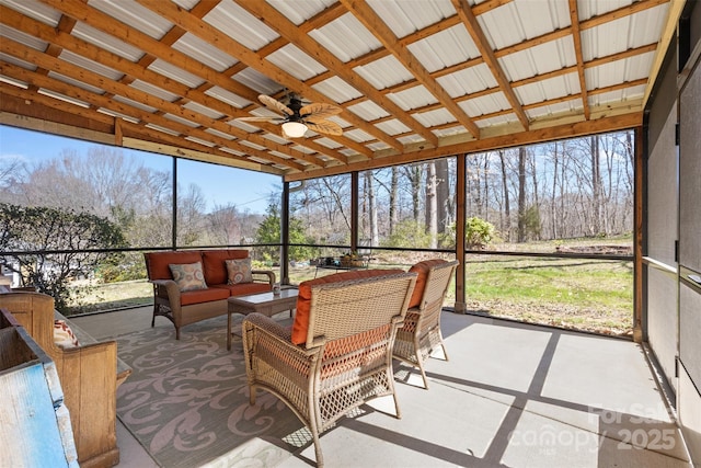 sunroom / solarium with ceiling fan