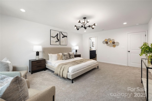 bedroom featuring recessed lighting, ensuite bathroom, light carpet, a chandelier, and baseboards