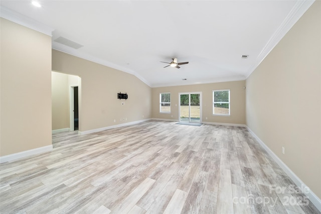 unfurnished living room featuring light wood finished floors, ornamental molding, and baseboards