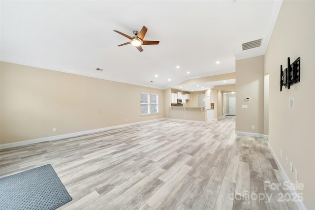 unfurnished living room featuring recessed lighting, visible vents, light wood-style floors, ceiling fan, and baseboards