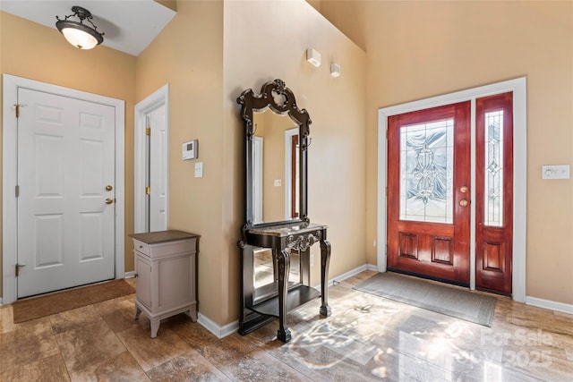 foyer entrance with baseboards