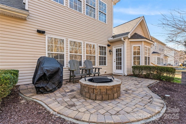 view of patio / terrace with an outdoor fire pit and area for grilling