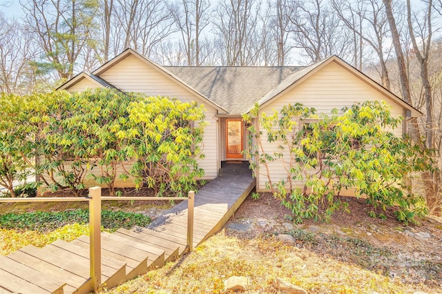 view of front of home featuring a shingled roof