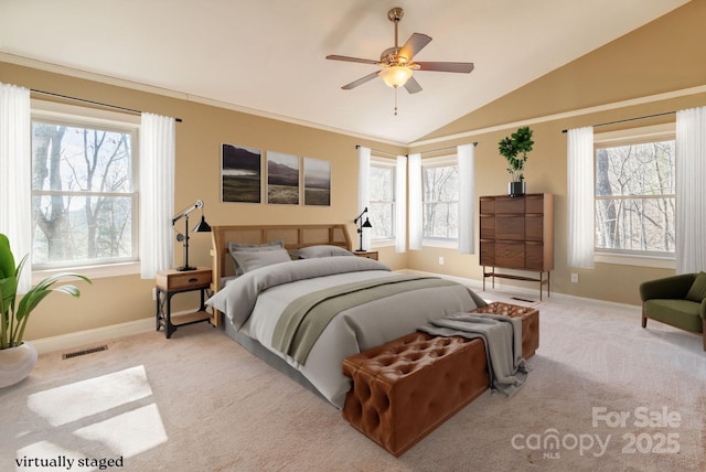 bedroom with lofted ceiling, baseboards, visible vents, and carpet flooring