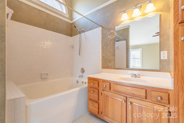 bathroom with ceiling fan, ornamental molding, tile patterned floors, vanity, and shower / bathing tub combination