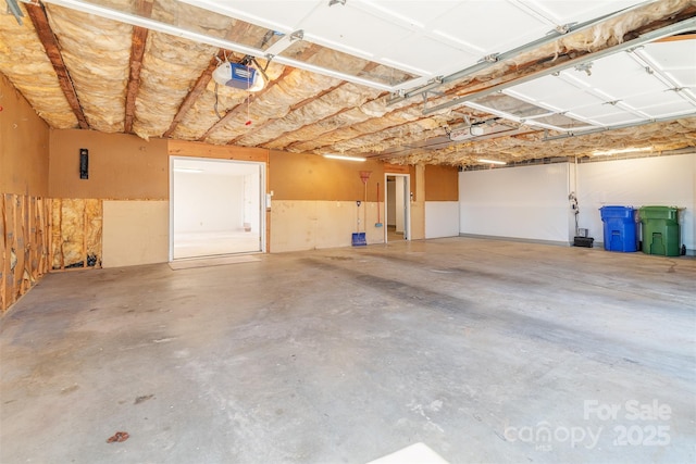 garage featuring a garage door opener