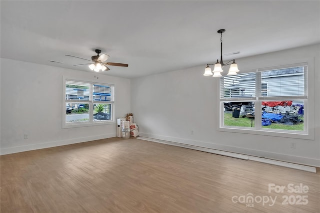 425 Messner St, Salisbury, NC 28144 - unfurnished room with wood finished floors, a chandelier, ceiling fan, and baseboards