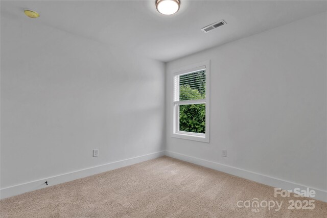 425 Messner St, Salisbury, NC 28144 - spare room with light carpet, baseboards, and a smoke detector