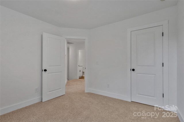 425 Messner St, Salisbury, NC 28144 - unfurnished bedroom featuring light carpet and baseboards