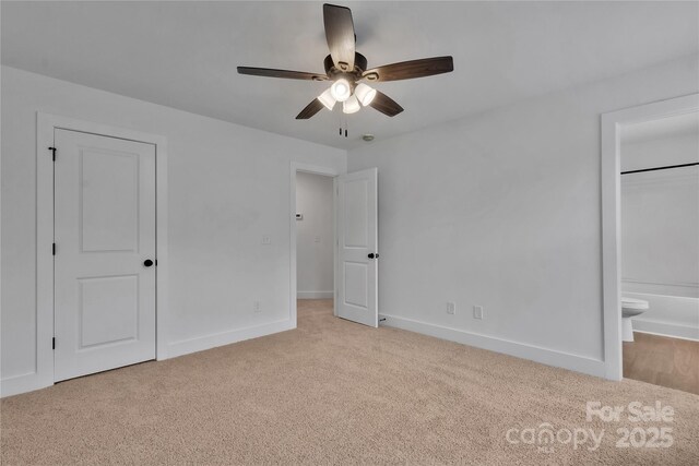 425 Messner St, Salisbury, NC 28144 - unfurnished bedroom with carpet, baseboards, ensuite bathroom, and ceiling fan
